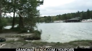 She takes two horny dicks outdoor