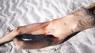 Stranger Finds a Perfect Tanned Skinny Brunette on a Nudist Beach and gives her a Hot Piss