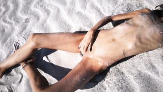 Stranger Finds a Perfect Tanned Skinny Brunette on a Nudist Beach and gives her a Hot Piss