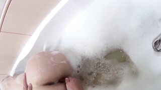 RUSSIAN GIRL TAKES a BATH WITH a PLUG IN THE ASS