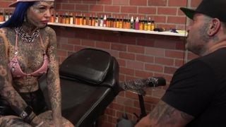 Behind the scenes for Amber Luke's new face tattoo