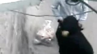 Paki Aunty in Black Burqa enjoys Muslim Sex with Paki Boy on Road