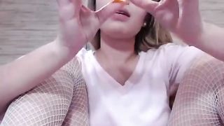 Incredibly Sexy and Busty Young Girl in Fishnets