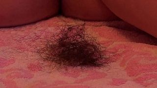 A fat girl shaves her hairy pussy and ass.