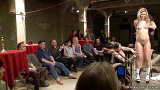 Taped blonde is fucked in public bdsm