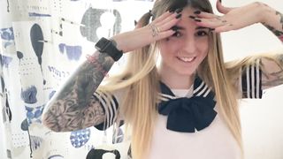 Girl in a sailor suit with big breasts