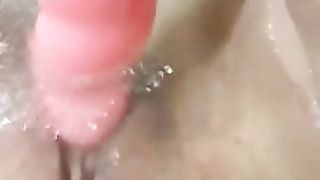 HORNY MILF MASTURBATES PUSSY WITH DILDO IN BATH