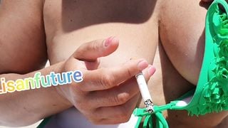 Public smoking cigarets with naked boobs