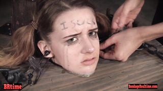 Bdsm babe trapped in a barrel and electrified