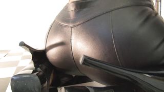 Blonde in Skintight Leather Pants gives POV show in bar