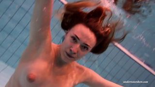 Firm big tits and red dress underwater on Duna Bultihalo