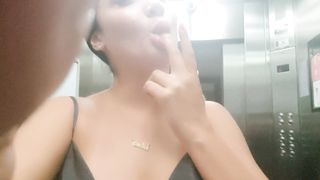Cute women caught squirting at the hotel's elevator