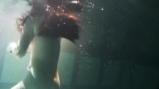Siskina and Polcharova strip nude underwater