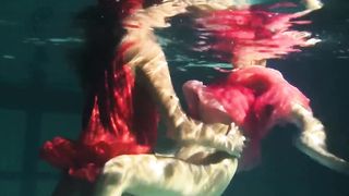 Lesbians and solo girls make out underwater