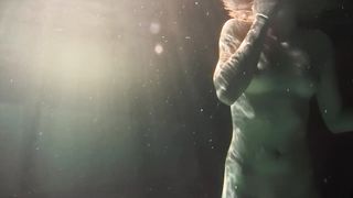 Lesbians and solo girls make out underwater