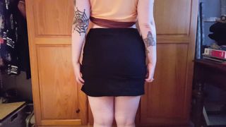 Tattooed girl in cute panties doing a wedgie.