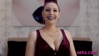 Classy redhead babe gives erotic webcamshow