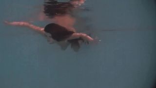 Babes swim and get naked underwater