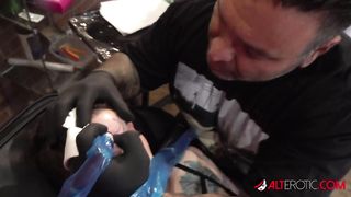 Tattooed slut gets new ink then masturbates in the shop