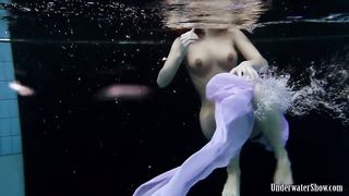 Enjoy Aneta in every pose in the pool