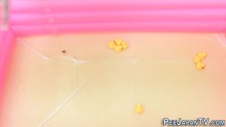 Japanese hos peeing in a pool