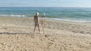 Naked Blonde on a Nude Beach. Masturbating and Pissing.