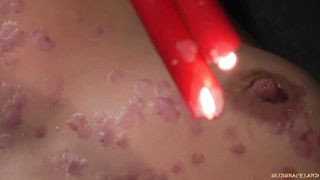 Redhead gets candle wax on her pussy has orgasm from bondage and BDSM