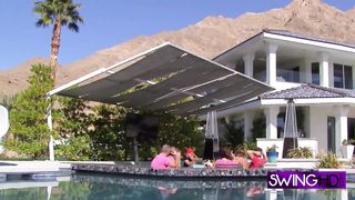 Elaborate couples settle down together to enjoy each other in a relaxing orgy filled with toys