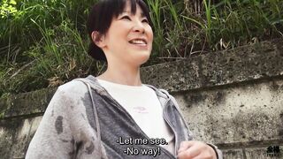 Sweaty older Japanese woman with massive tits uses them on my feet