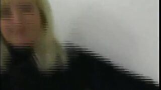 Mature blonde is having fun in the living room