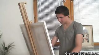 Two young painters bang granny