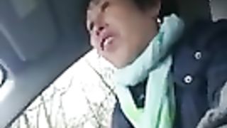 homemade, older chinese lady wanks cock in car
