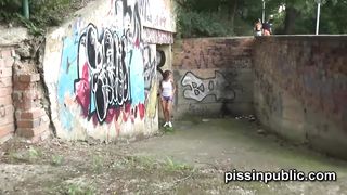Desperate girls must pee in public park but get caught on camera