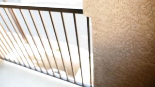 Gorgeous Girlfriend Bestows Public Blowjob on Balcony