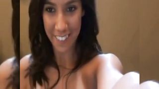 WWE Superstar AJ Lee Peeing